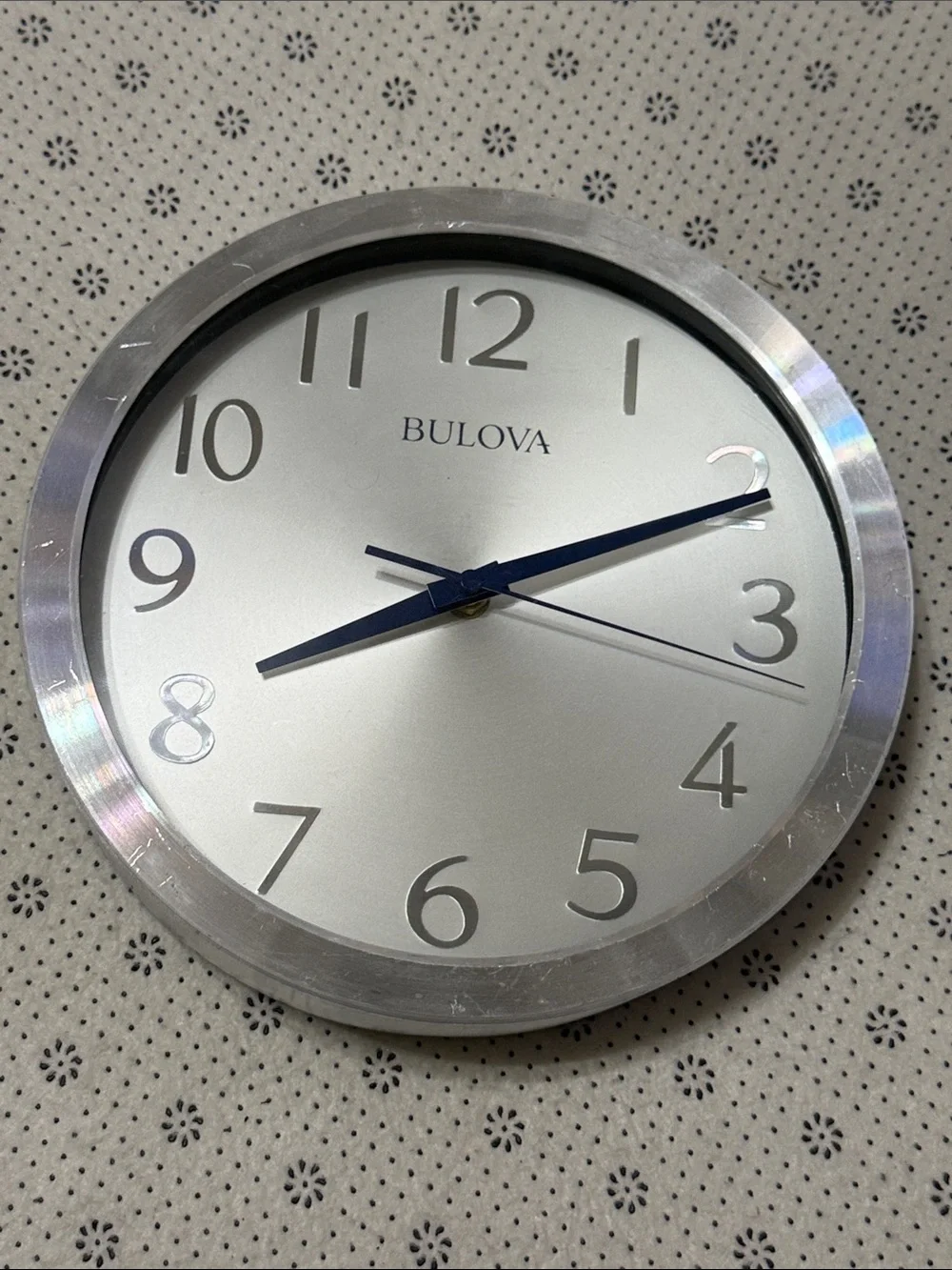 Bulova Silver Wall Clock with Blue Hands and Silver Dial